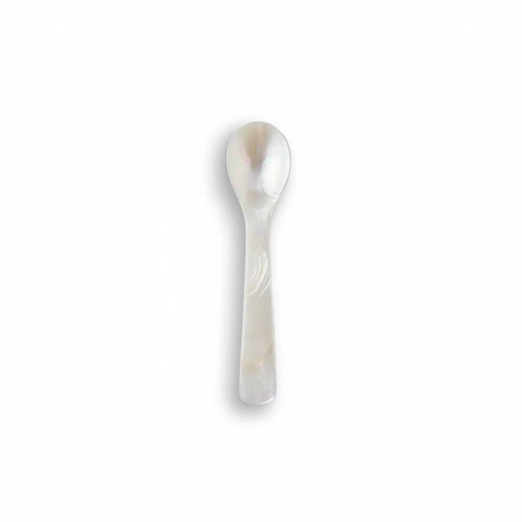 white mother of pearl spoon